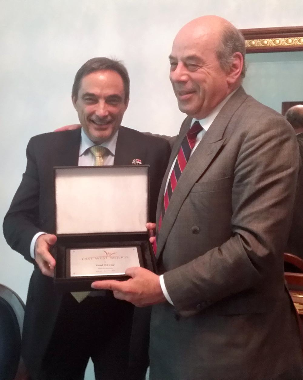EWB President Jovan Kovacic awards European Trilateral Commi…n Director Paul Revay with an EWB Memorial Gratitude Plaque